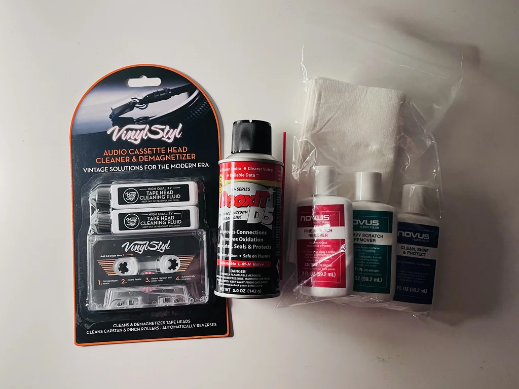 'Vinyl Styl' branded cassette head cleaner & demagnetiser, DeoxitD5 spray can, and three bottles of plastic polish